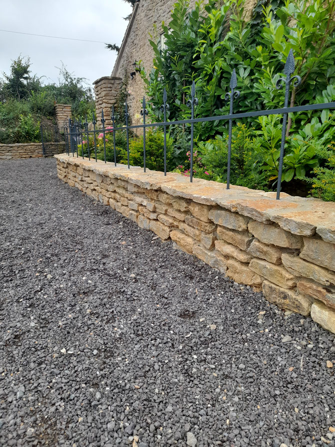 Wall with coping stone