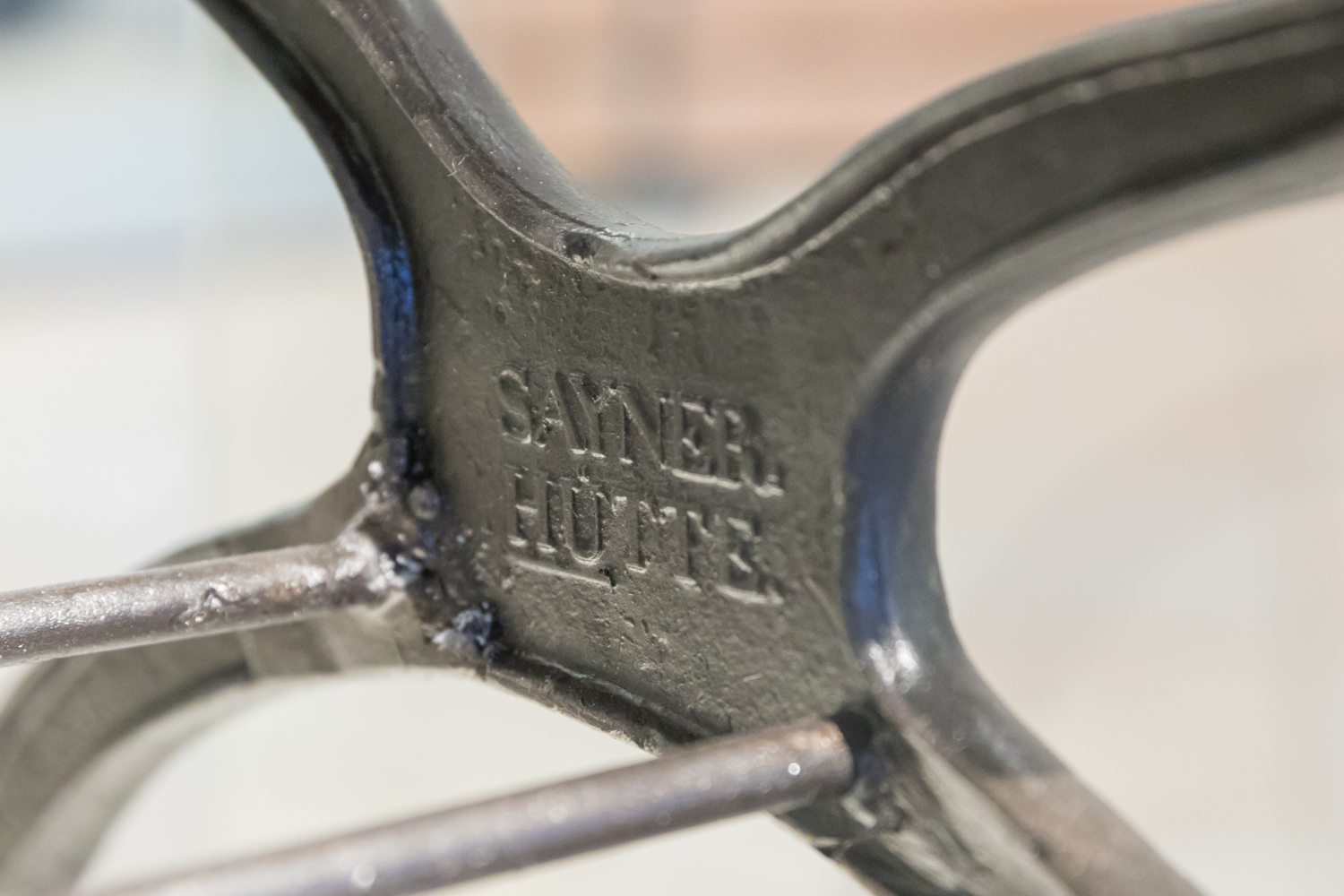 A section of the Schinkel chair, marked SAYNER HÜTTE.