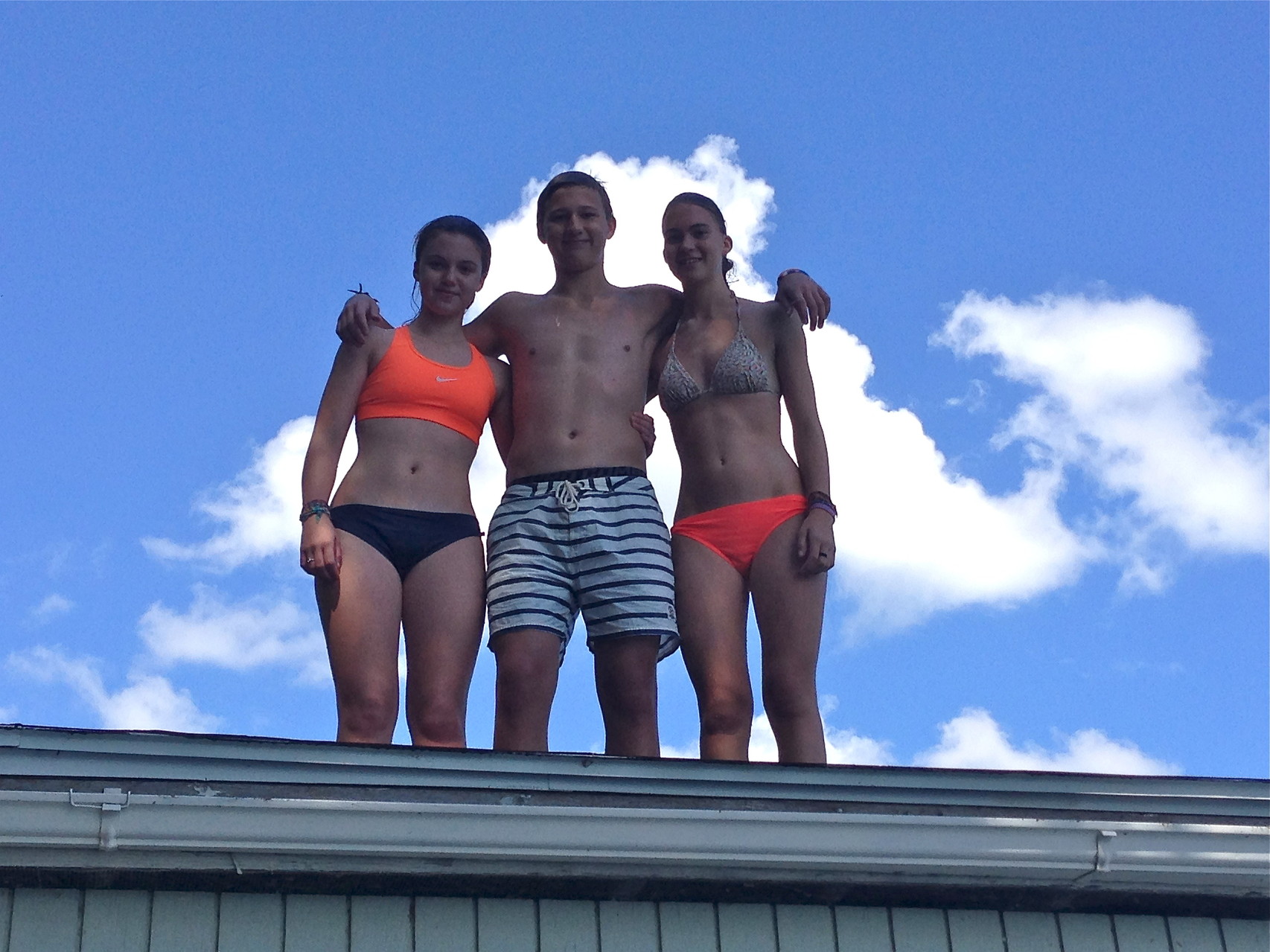 on the boathouse roof, Skaneateles Lake