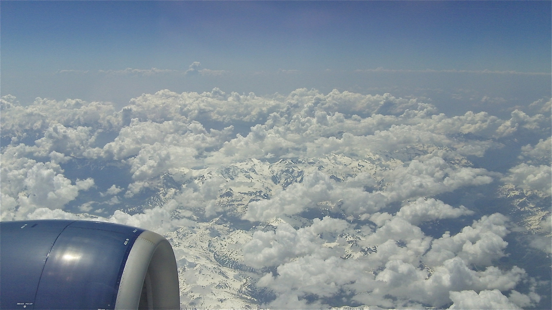 Clouds and Swiss Mountains, flight to NYC from Athens