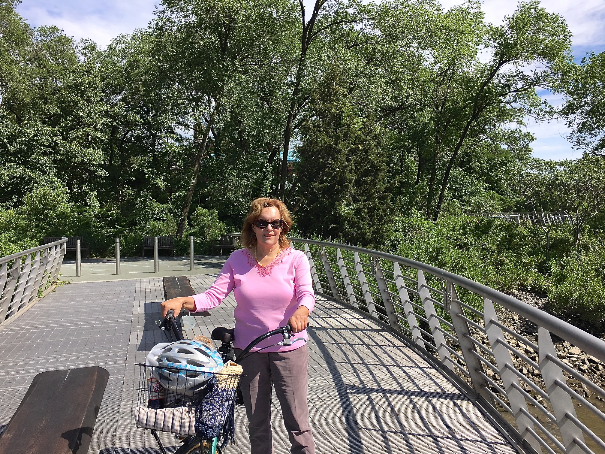 Lorraine Gudas biking along the Harlem River, 6-4-17