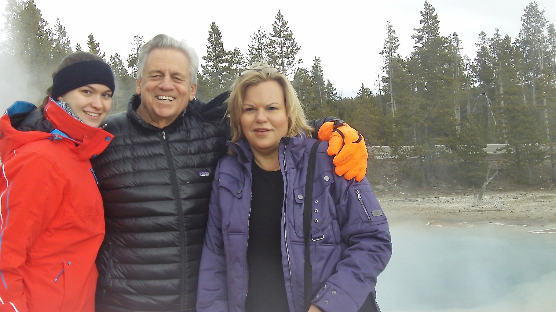 Ellie, Stuart Sr., and Celeste at the boiling pool in Yellowstone