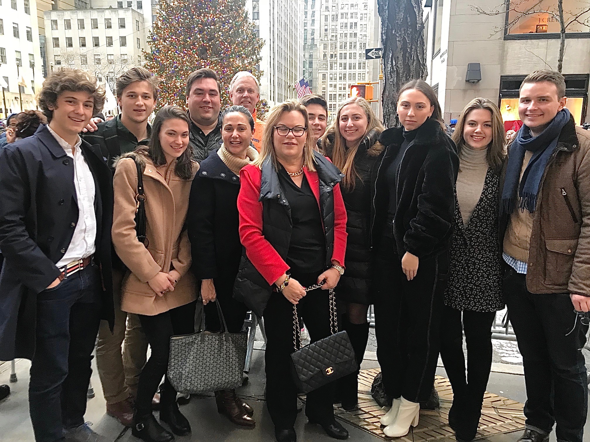 Ellie's friend, Jack, Ellie, Greg, Allie K., Stuart Jr., Celeste, Stuart 3d, Gabby, Kate,  and a friend  at Rock. Center with the Xmas tree, Dec. 229, 2018