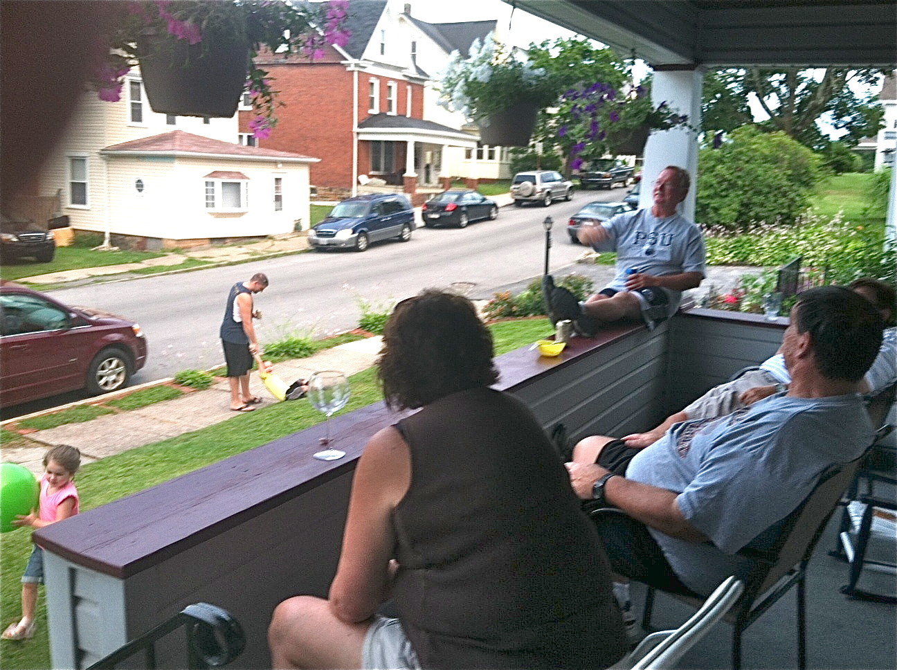 Jill, Walter (Rachel's father), Paul, & John on the front porch (Jason in background) 