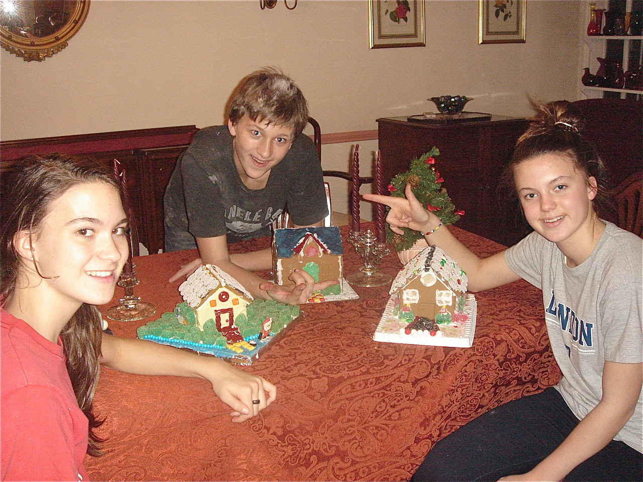 Ellie, Jack & Kate with their gingerbread houses. Ellie's is modeled after the Skaneateles lake house.