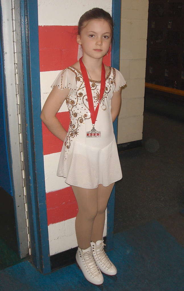 Kate wins a medal skating