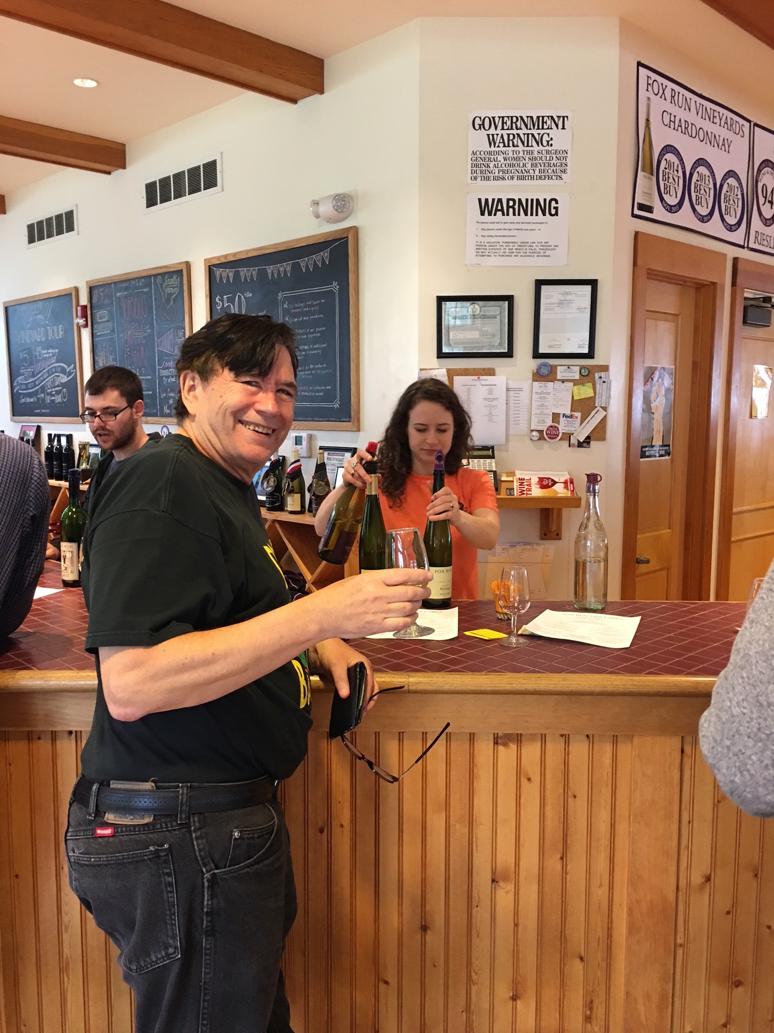 John tasting wine, Seneca Lake, 4-15-17