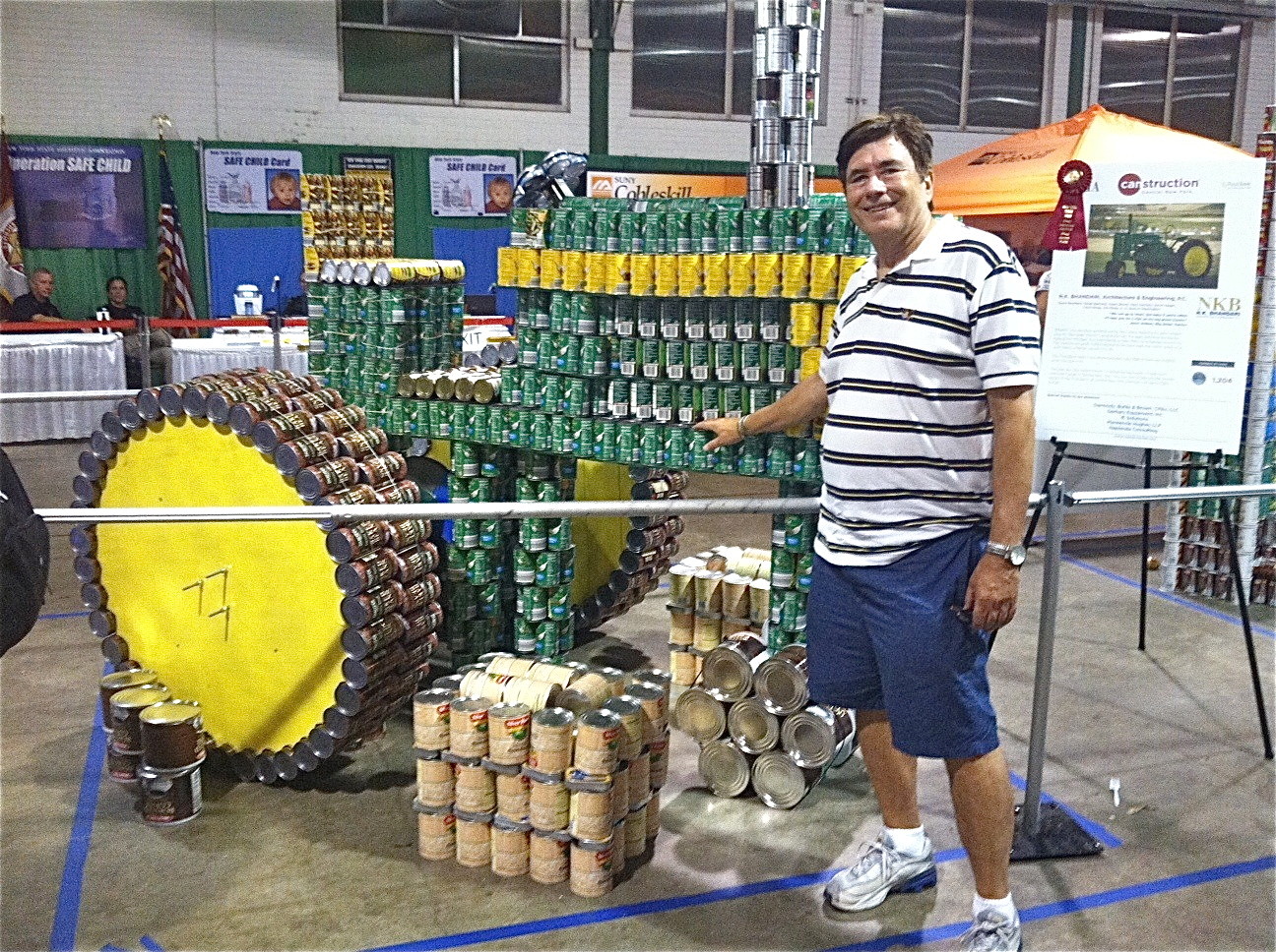 John with tractor made of cans