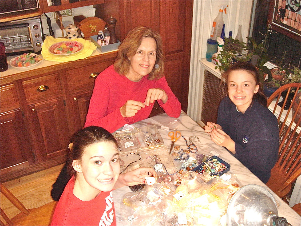 Ellie, Lorraine, & Kate making jewelry, 12/2012