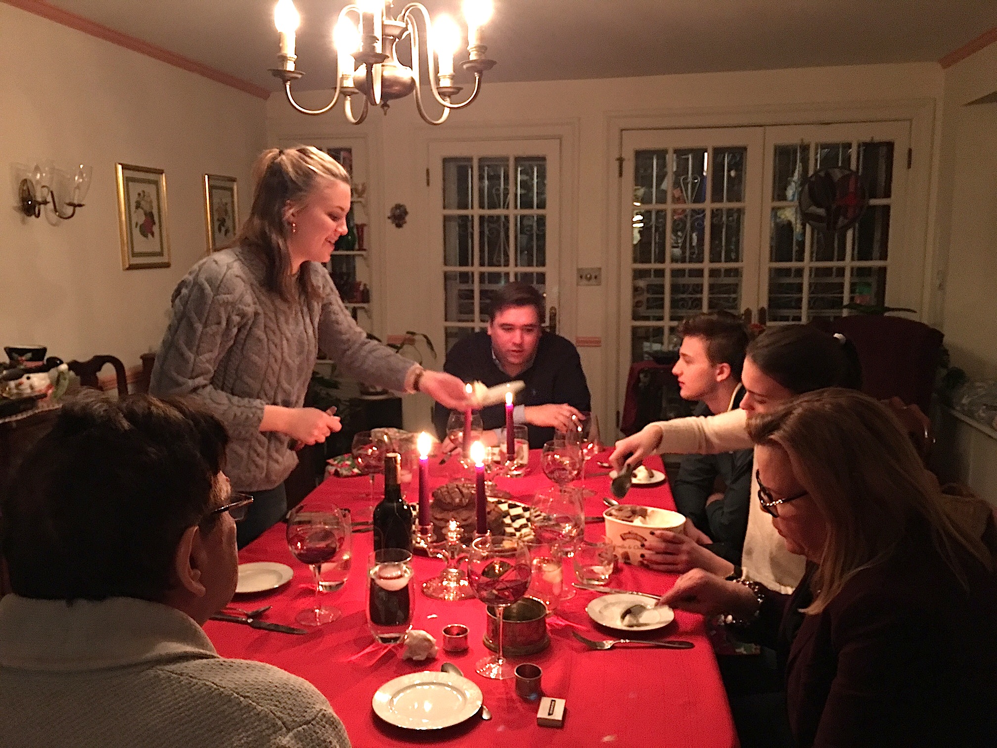 Kate serves Greg's chocolate B'day cake!