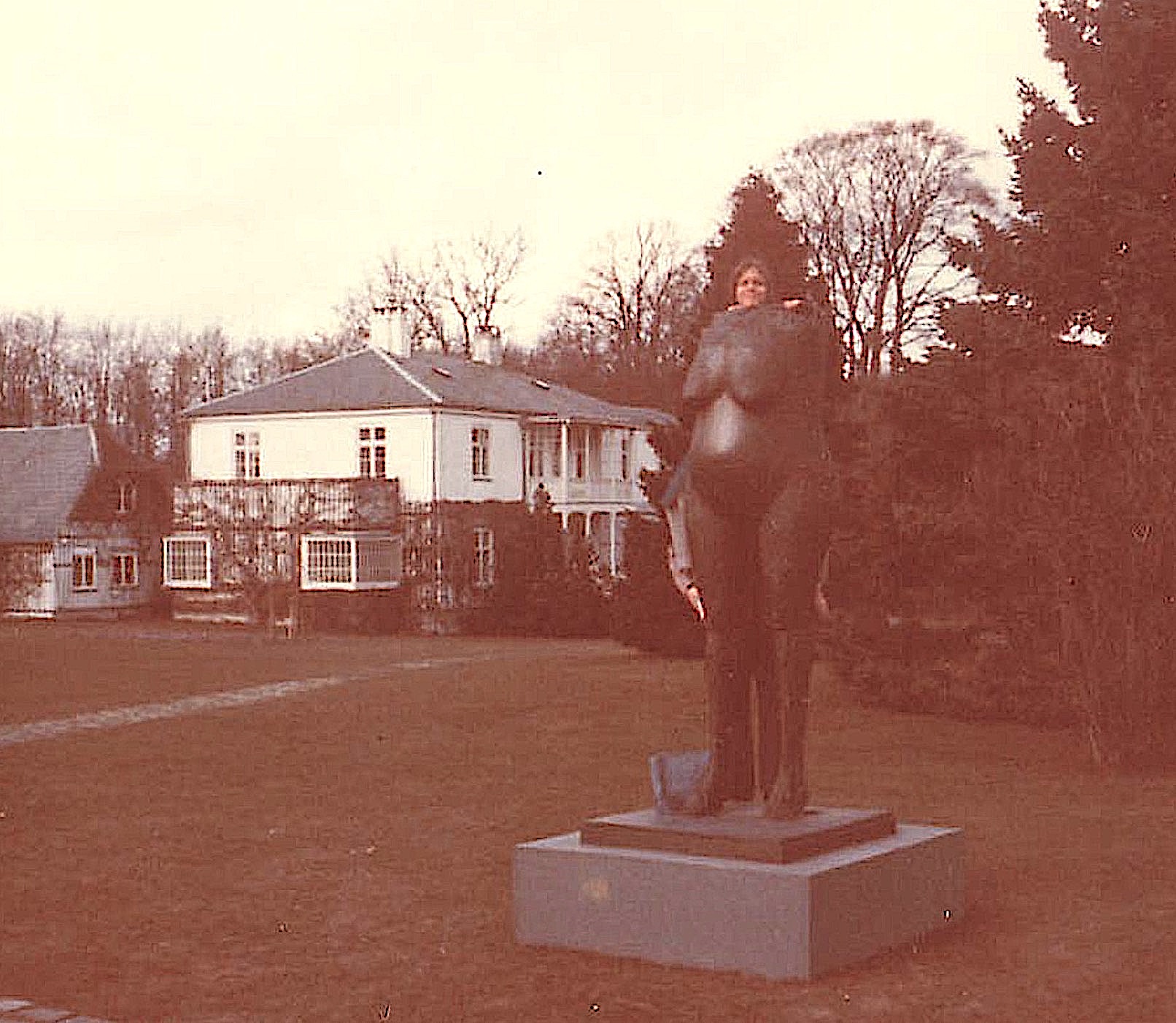 Celeste on Al's shoulders at a museum 