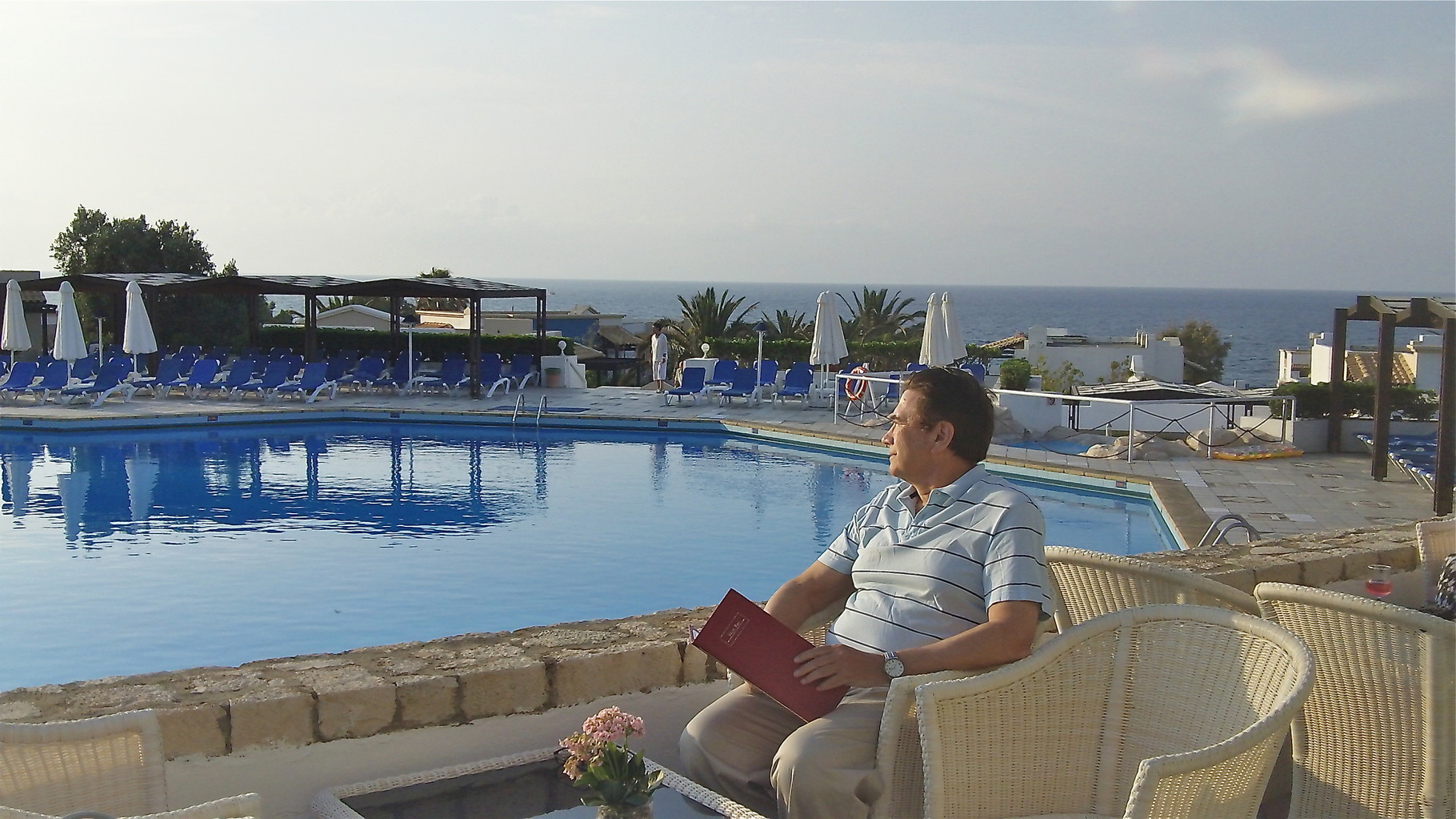 Sunset and drinks by the pool at our hotel.