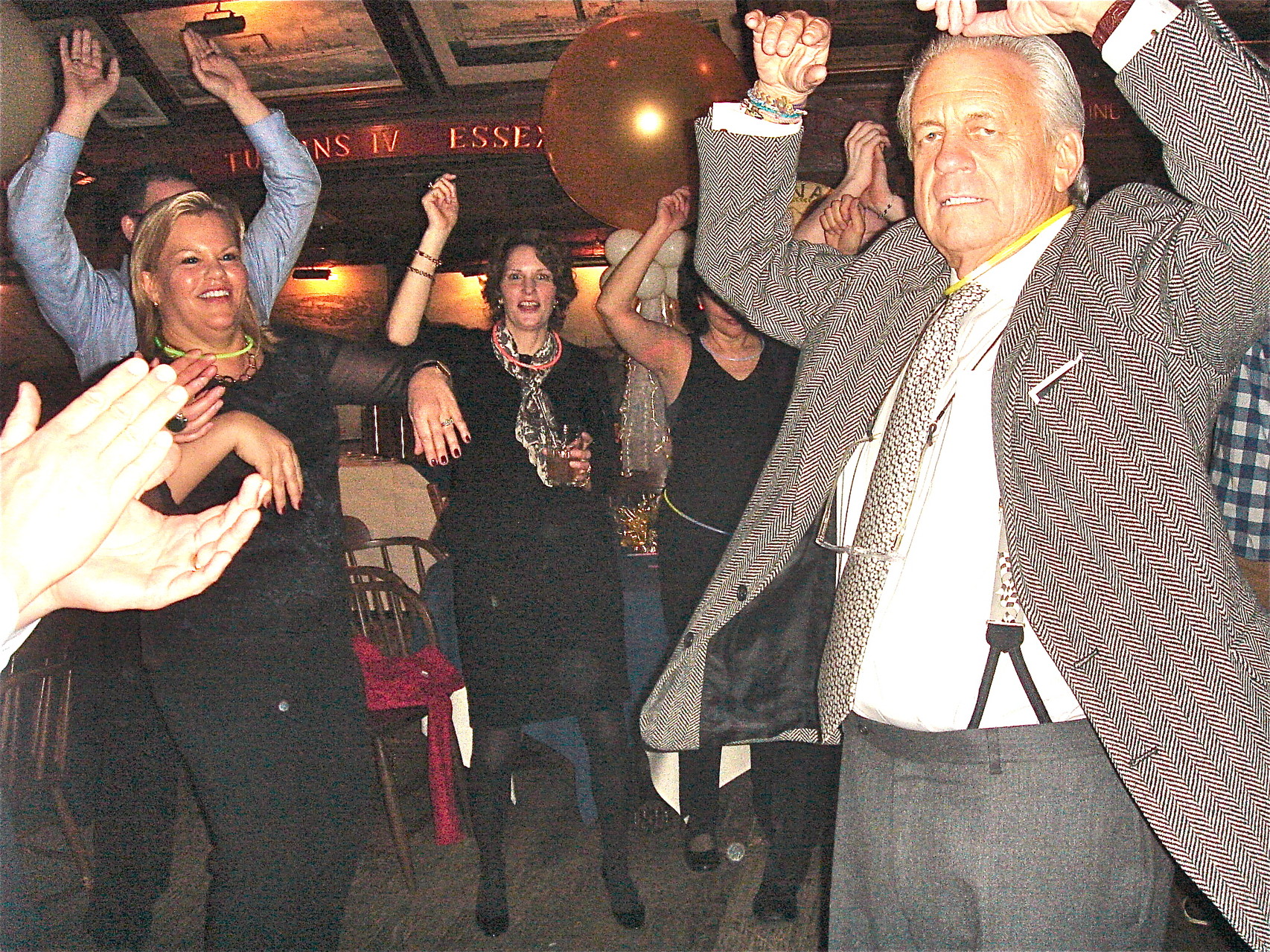 Celeste and Stuart show get down on the dance floor; Lisa Kagel in middle in back.