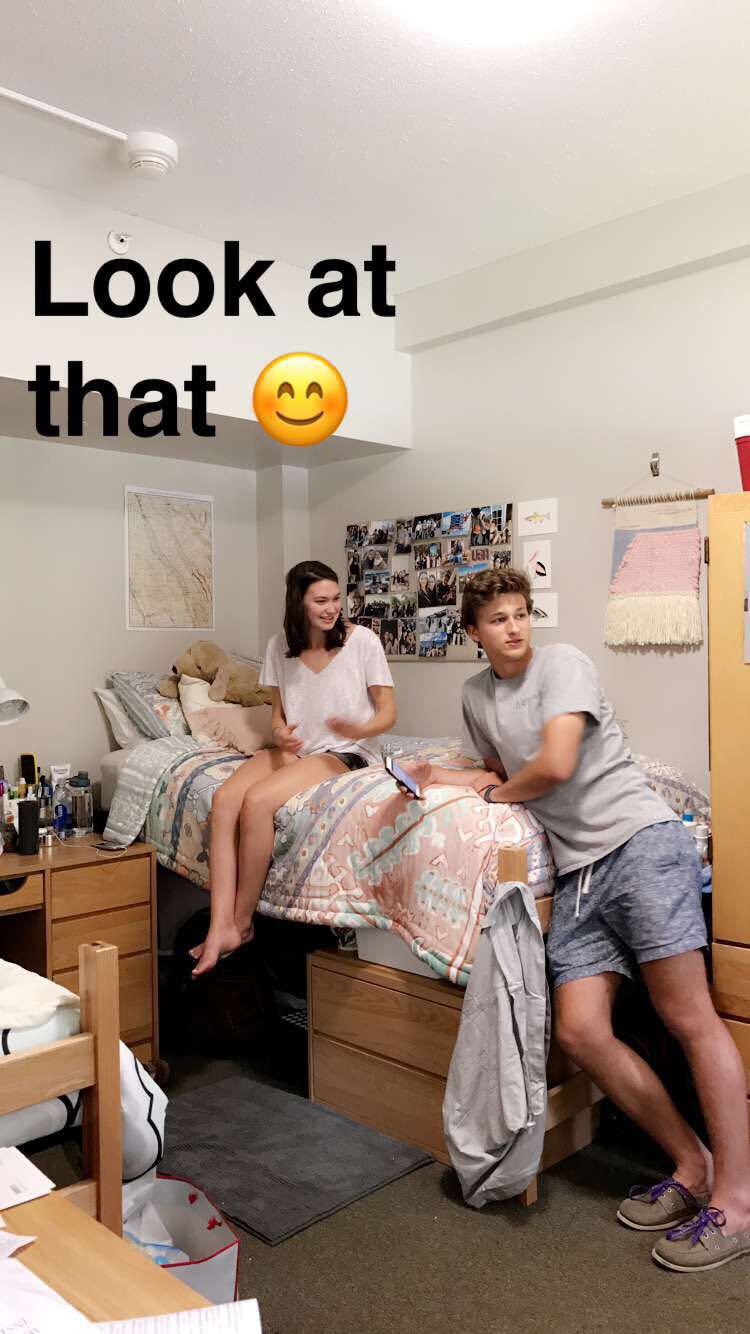 Ellie in her college room with Jack, late August, 2017