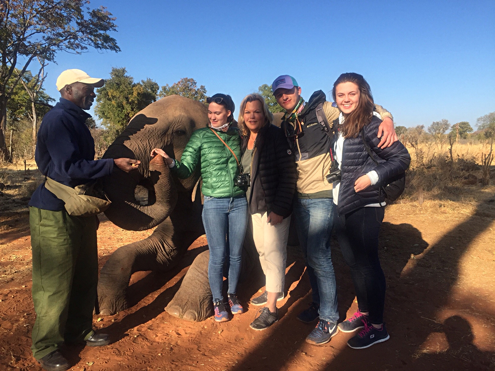 Celeste and Kate, Ellie, & Jack with elephants, Botzwana, Africa 6/16