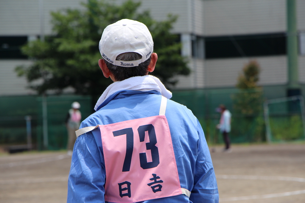 背中で語る男