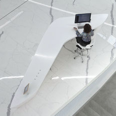 solid surface reception desk in unique form