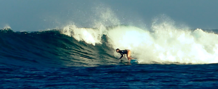 Lucy Campbell focussing on holding deeper bottom turns with the back arm reaching forward so the hand almost glides the wave. AKA Julian Wilson