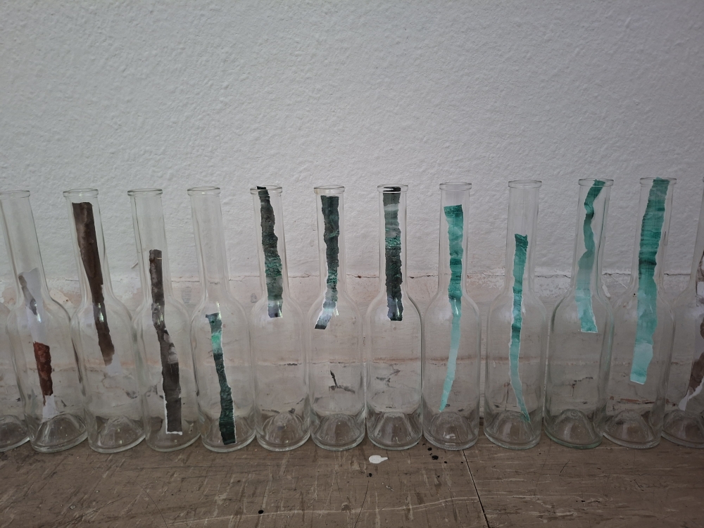 The essenz in the bottles.  Fundstücke, Acryl, Papier