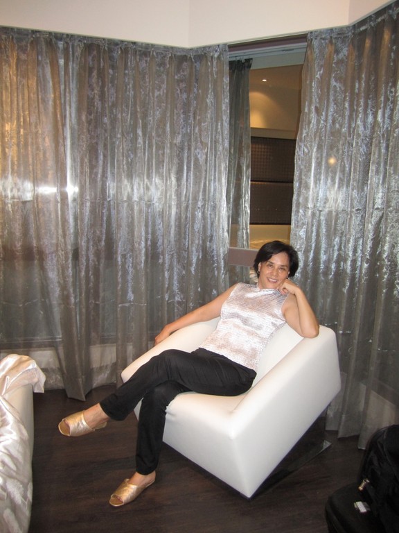 My aunt in a very fancy chair