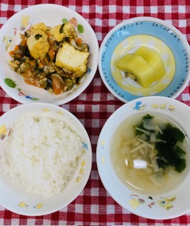 7/13　ご飯  中華スープ  厚揚げの炒め物  キウィフルーツ