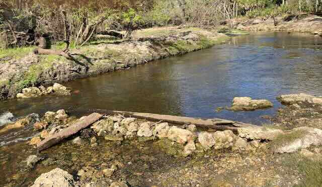 Dam placed by people digging in the river, removed by volunteers