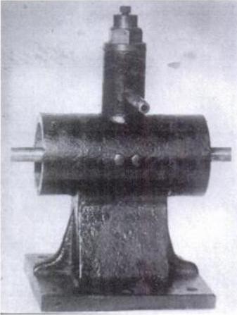 Simple mechanical oscilator used in first experiments - Original reciprocating steam engine, latter fitted with coils and magnetic fields to produce currents of precisely constant frequency