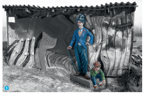 Zinnfigur vor einem kolorierten Bild 