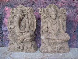 nice potted statues of hinduistic gods