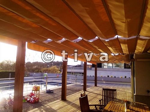 Toldo Corredero en estructura de madera