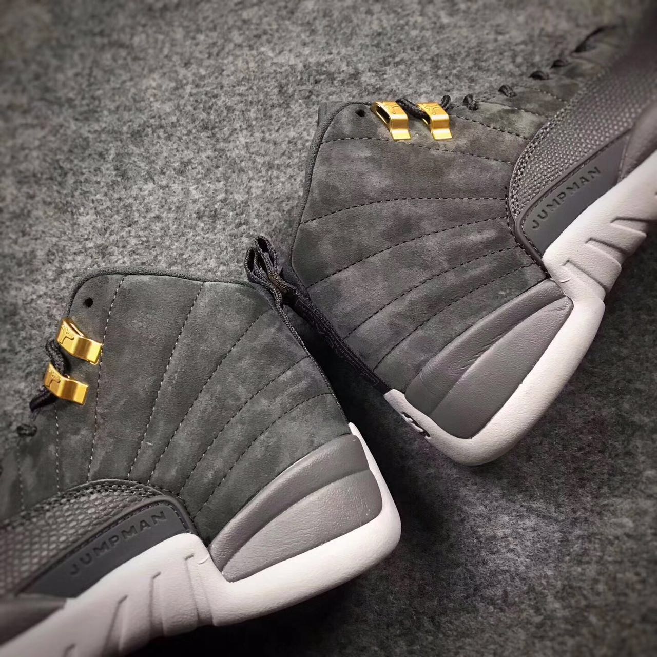 Gray jordan retro 12 sales
