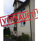 Reihenhaus mit Büschen davor