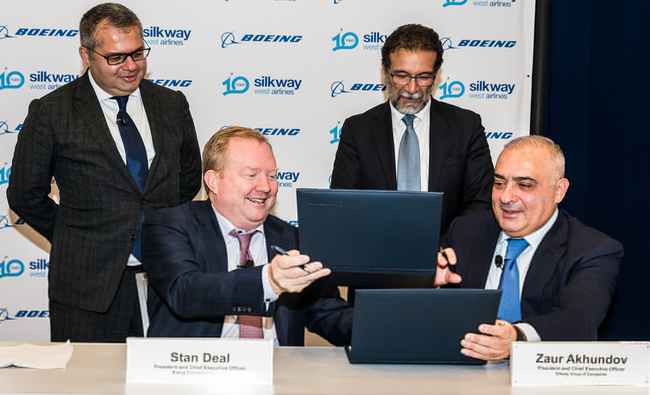 The happy look of men buying new planes: (left) Stan Deal, Boeing, (right), Zaur Akhundov, Silk Way Group. Image: SilkWay West