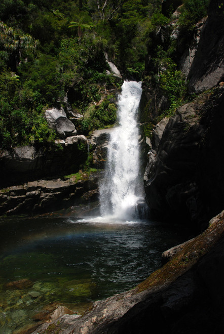 The Wainui Falls after a dry spell. Cutting through limestone they are here held up by a granite instrusion that forms of the Separation Point granites.