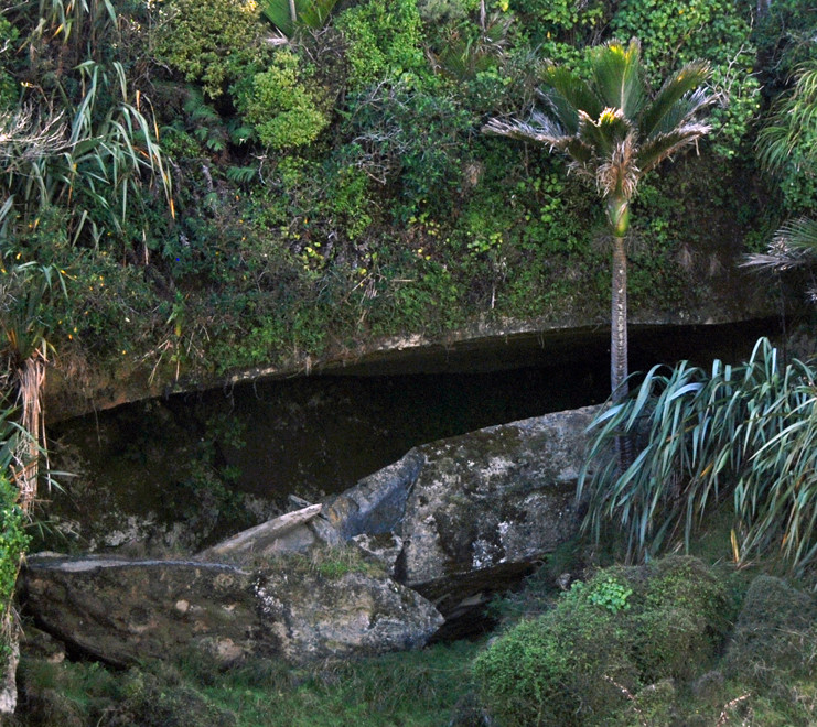 A huge cleft in the limestone where a slab has fallen from above after being undermined from underneath?