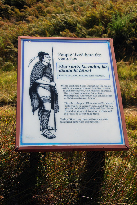 The blandishments of reconciliation reduced to a minimalist memorialisation of past complexities: signpost of Okia Flat on the Otago Peninsula 