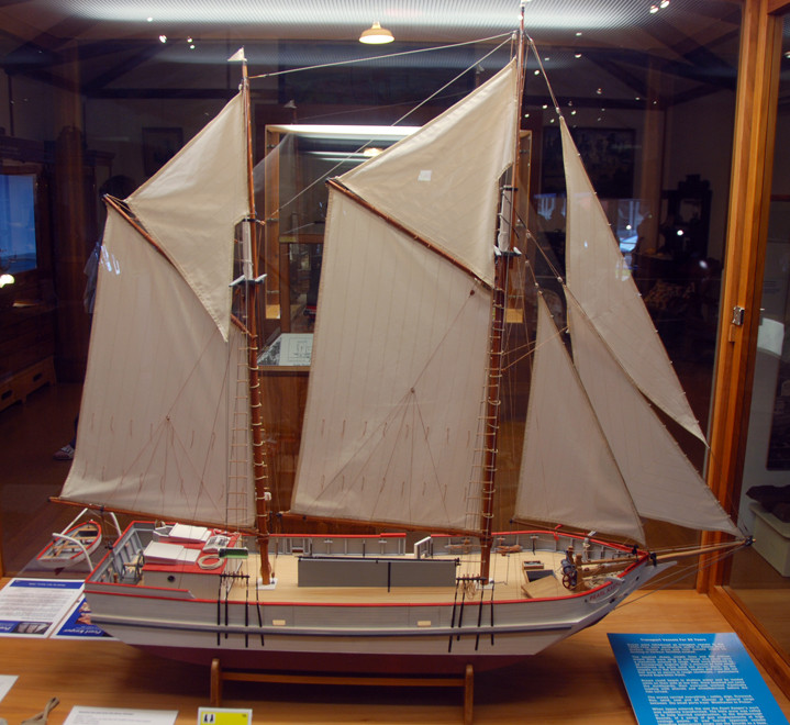 Model of a scow, a shallow draught vessel ideal for the shallow seas of Golden Bay. They were used from the 1890s  for all sorts including shipping butter in to Wellington in kahikatea boxes - clink l