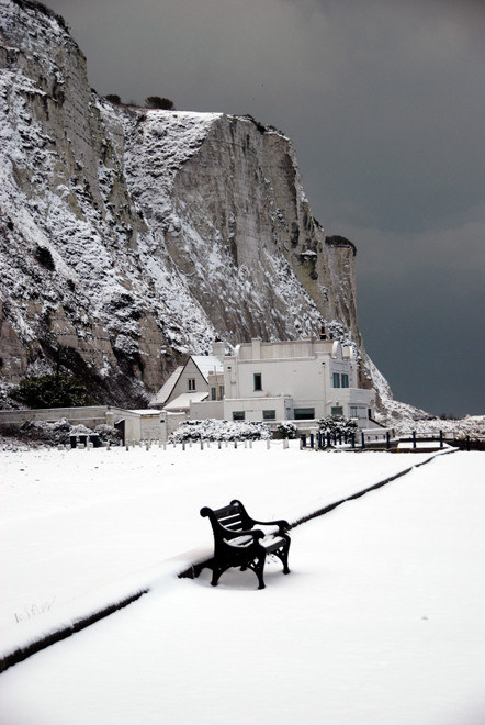 The empty bench: dark clouds frame the cliffs at the north end of St Margaret's Bay, 21st January, 2013
