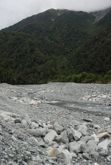 The rubble washed out by Kelly's Creek: 'a braided stony greywacke riverbed'