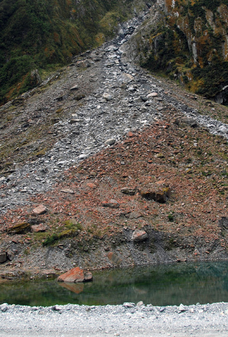 Scree and lake made by underground ice melting after the Fox Glacier's retreat from its highpoint in the 1890s.