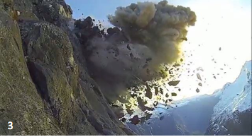 Blast to remove a 2,000 tonne rock pinnacle dangerously lossened by frost action above the western portal of the Homer Tunnel in 2013 (click for source).