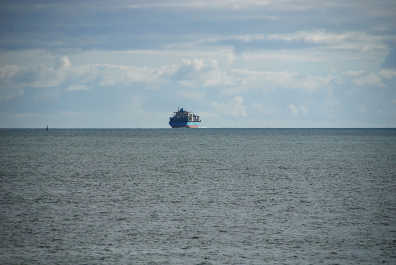 The Lexa Maersk heading for the open sea of the Pacific Ocean via the Rangitoto Channel and the Hauraki Gulf.