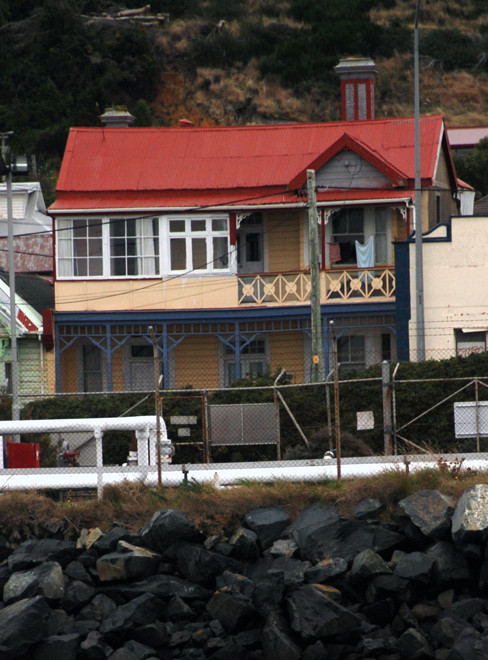 Colonial house with veranda and balcony on Marine Parade, Bluff, NZ. 