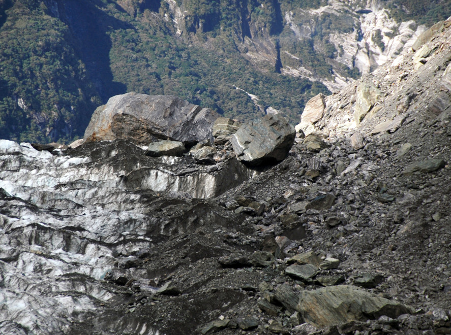 Rock debris, perched boulder and massive chunk of rock ion the right hand side of the Fox Glacier just below Victoria Flat.