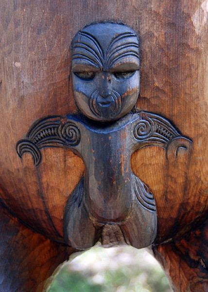 Detail of Maori tradtional carving at Karekare Beach, Auckland. I am unsure if this represents the male or female gender. 