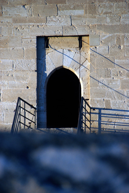 Raised dorrway of the 15th century keep of the castle on the Knights Hospitaller at Kolossi in evening light, January 2013.