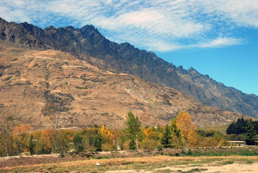 The northern end of The Remarkables, Otago with parched hills and early autumn colours.