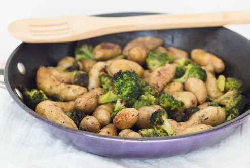 Easy Roasted Potatoes with broccoli make the perfect complement to any weeknight meal.  Just add your favorite cooked protein and you've got a complete, healthy meal! These easy roasted potatoes with broccoli make the perfect complement to any weeknight m