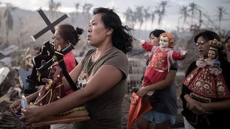 In the Philippines, survivors of Super Typhoon Haiyan march during a religious procession (Getty Images)