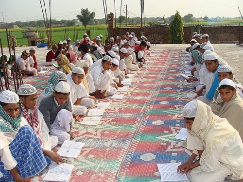 Children from poor families being taught Militant Islam in Pakistan, many later joined the Taliban.